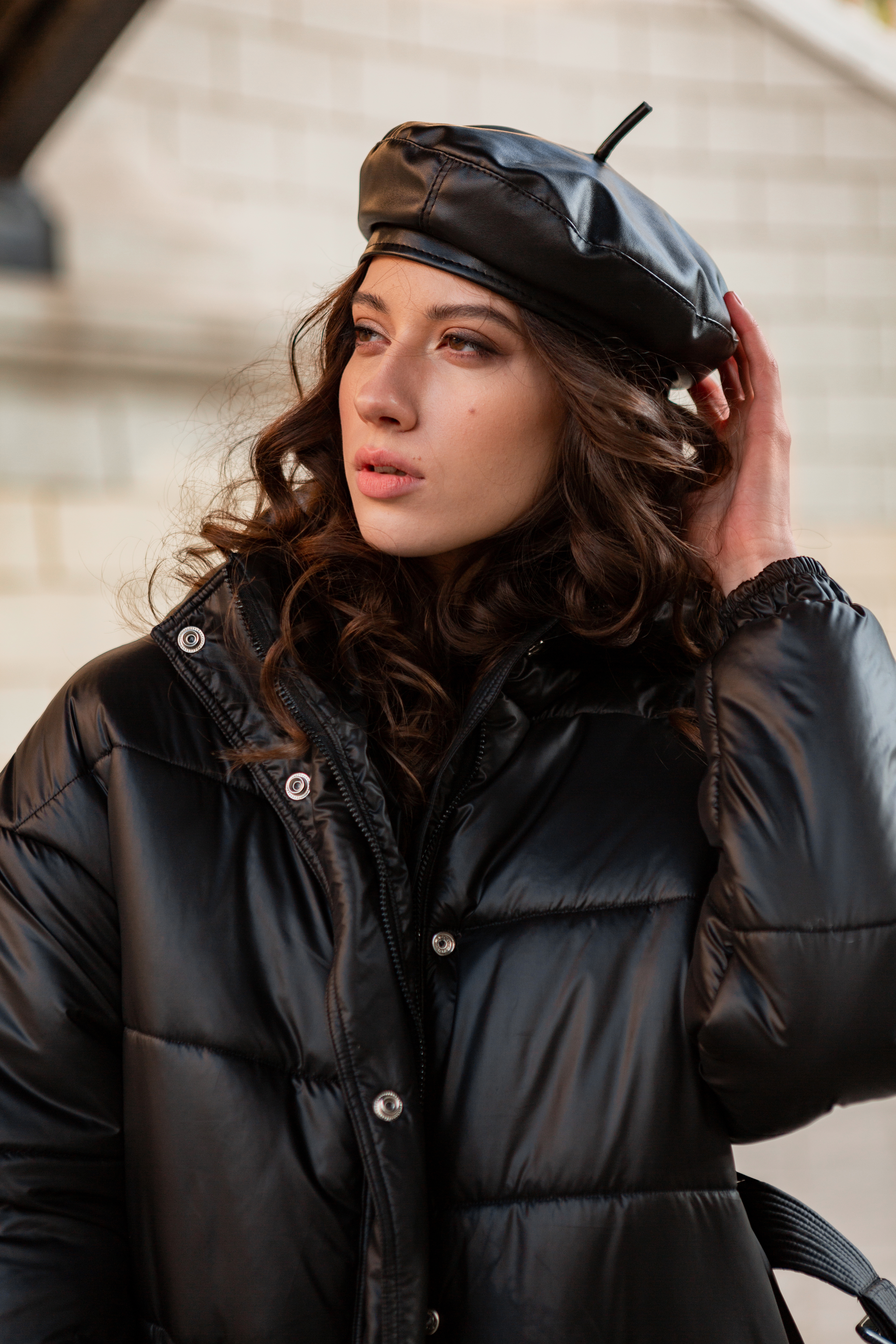 stylish-woman-posing-winter-autumn-fashion-trend-black-puffer-coat-leather-hat-beret-old-beautiful-street (2).jpg